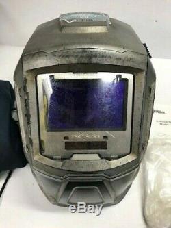 MILLER T94 Auto-Darkening Welding Helmet with external grinding low batt light